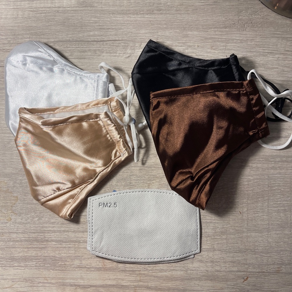 Never Worn Facemasks - Set of 4